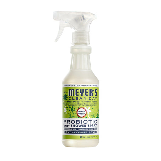A 16 fl oz bottle of Mrs. Meyers Probiotic Daily Shower Spray Cleaner in Lemon Verbena scent, with a spray nozzle and green-yellow label design, effectively tackles soap scum and highlights its impressive cleaning power.