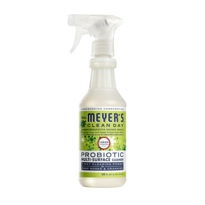 A 16-ounce Mrs. Meyers Probiotic Multi-Surface Cleaning Spray in Lemon Verbena scent, featuring a green label with leaf patterns, offers effective cleaning power for various surfaces.