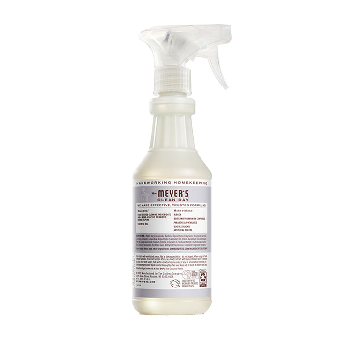 Mrs. Meyers Probiotic Multi-Surface Cleaning Spray features a translucent bottle with a white nozzle. The label highlights its lavender scent, cleaning instructions, and safety information.