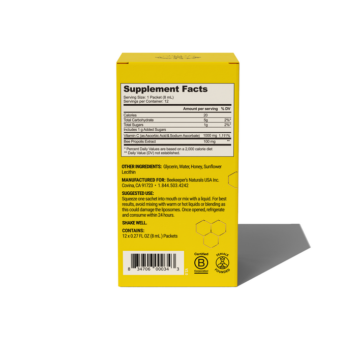 A yellow box of Beekeepers Naturals Propolis Liposomal and Vitamin C supplements features black text on the back, detailing Supplement Facts, ingredients, manufacturers address, and size. It supports immune health with Propolis. B Corporation and recycling logos are displayed at the bottom.