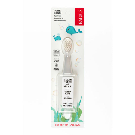 Radius Pure Brush 6 mo+ baby toothbrush features ultra soft, non-toxic bristles, gentle on sensitive gums. ADA accepted and eco-friendly, it comes in white packaging with blue whale illustrations. Made in USA—safe for delicate mouths.