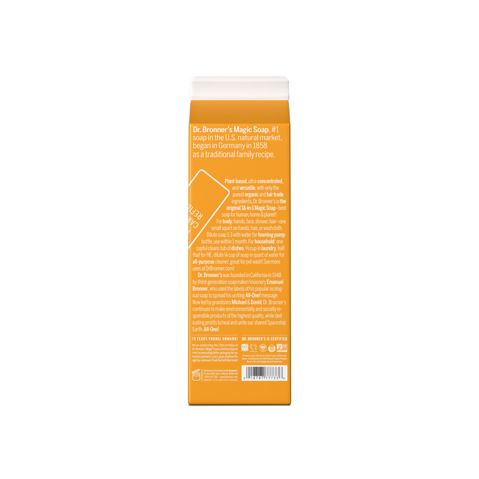 The image displays the back of a Dr. Bronners Pure-Castile Liquid Soap Refill Carton, with an orange background and white text detailing the brands history and organic ingredients. A barcode is visible at the bottom, highlighting its eco-friendly packaging.