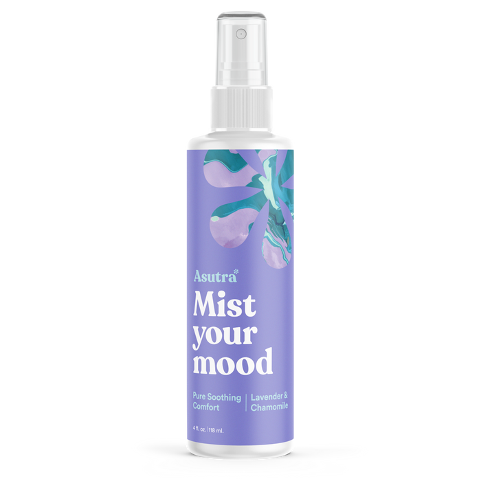 The Pure Soothing Comfort Aromatherapy Mist by Asutra features a purple label with floral graphics and offers a soothing blend of lavender and chamomile. This 4 fl oz (118 ml) vegan mist promises pure, calming comfort.