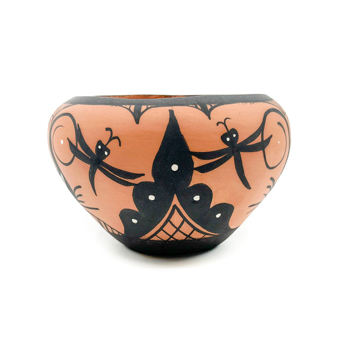 By&nbsp;Zuni artist&nbsp;Darla Westika Signed on the bottom by the artist Design includes stylized rain birds &amp; dragonflies&nbsp; Hand etched terracotta clay painted with natural pigments&nbsp; Measures approximately&nbsp;3.75 inches high x&nbsp;5.50 inches in diameter at widest circumference