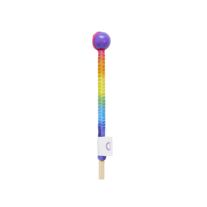 The Rainbow Streamer by Sarahs Silks features a vibrant fabric cover with a wooden handle, ideal for open-ended play. It has a round purple rubber end at the top and includes a small label near the handle.