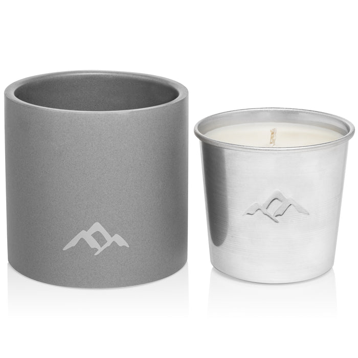 Two Murphys Naturals candle holders with a mountain logo enhance ambiance; the left is a gray cylinder, while the right is metallic and acts as a Refillable Mosquito Repellent Candle infused with essential oils. Both are displayed on a plain white background.