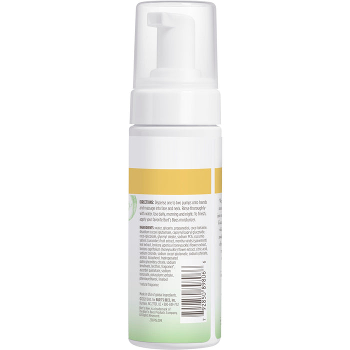 A white and yellow pump-top bottle of Burts Bees Refreshing Foaming Face Cleanser exudes a cucumber-mint blend. The back label shows usage instructions and natural ingredients. Bottom features include a barcode and product info.