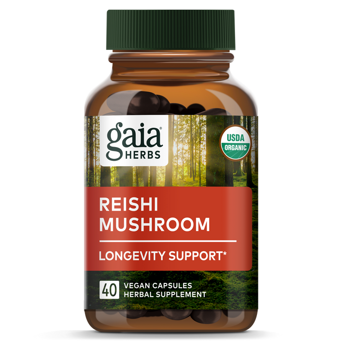 A bottle of Gaia Herbs Reishi Mushroom capsules, labeled for immune and heart support, contains 40 USDA organic-certified vegan capsules. The amber bottle with a green cap and forest background highlights its adaptogen properties.