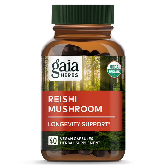 A bottle of Gaia Herbs Reishi Mushroom capsules, labeled for immune and heart support, contains 40 USDA organic-certified vegan capsules. The amber bottle with a green cap and forest background highlights its adaptogen properties.
