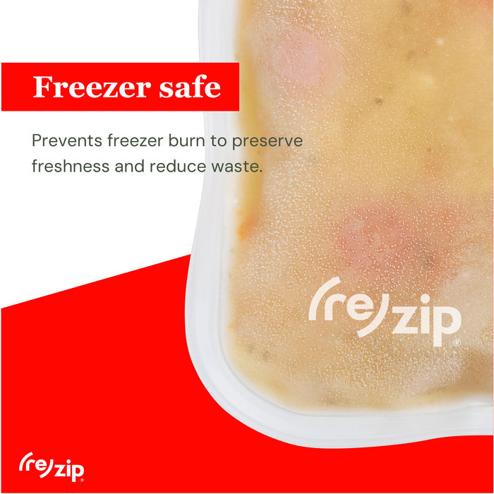 Close-up of a frozen food container with frost inside, showing partial contents. Text: (re)zip Reusable Leakproof Bags Stand-Up Starter Kit prevents freezer burn, keeps food fresh, and cuts waste. (re)zip logo in bottom left and right.