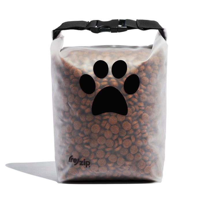 The (re)zip Reusable Pet Food Storage Bag - Medium, 14 Cup is a translucent, resealable travel bag with a black roll-top closure, filled with brown kibble and featuring a large black paw print on the front.
