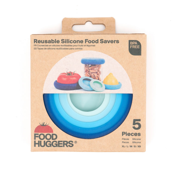 Food Huggers Reusable Silicone Food Savers come in a brown box with a display window revealing vibrant rings. The packaging emphasizes their BPA-free material and includes five pieces in assorted sizes (XL, L, M, S/XS) for space-saving storage.