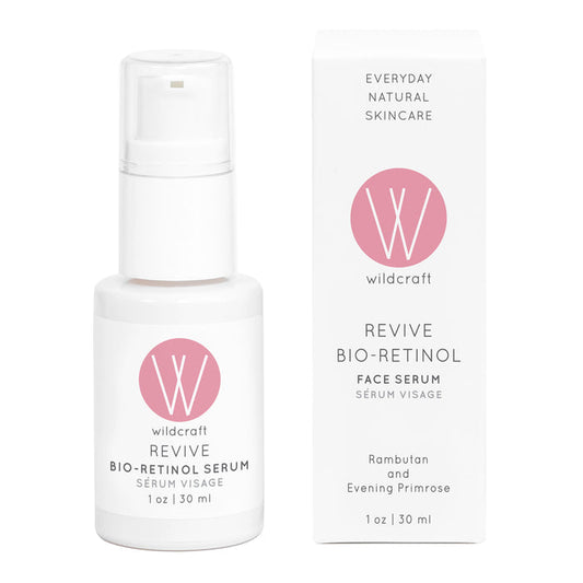 Wildcrafts Revive Bio-Retinol Face Serum comes in a white bottle and box with a pump dispenser and pink logo, highlighting its natural focus. It features plant-based retinol from rambutan and evening primrose, perfect for sensitive skin. Contains 1 oz (30 ml).