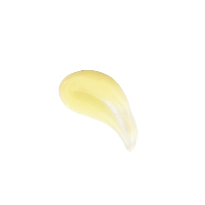 A small, curved dollop of Naturally London Rosehip Hydrating Cuticle Oil with Willow Bark, pale yellow and glossy, is shown on a white background—ideal for achieving healthy nails.