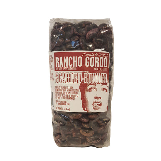 Scarlet Runners are one of the oldest cultivated foods of the New World! From the heart of Oaxaca, these big, fat beans are less starchy than Limas but more substantial than other Runner beans. The beans are firm and stay whole, but you can keep cooking them and they'll go from starchy to creamy. Despite their thick skin, they exude a beautiful, rich bean broth that needs little help to be enjoyed. Wonderful with mushrooms and lots of garlic. 1 pound bag