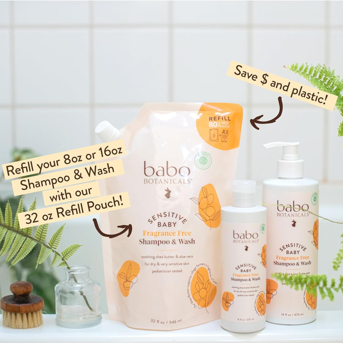 Babo Botanicals Sensitive Baby Baby Shampoo & Wash bottles and a 32 oz refill pouch are shown alongside plants, underscoring their gentle, plant-based ingredients. The display emphasizes eco-friendly benefits—refill your bottles with the larger pouch to save money and reduce plastic waste—making this cleanser from Babo Botanicals a smart choice for delicate skin.