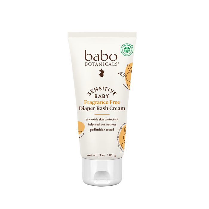 A 3 oz tube of Babo Botanicals Sensitive Baby Zinc Diaper Rash Cream rests on a white background, with soft yellow packaging accents and plant-based ingredients that are gentle for delicate baby skin.