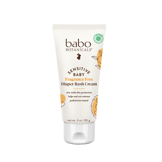 A 3 oz tube of Babo Botanicals Sensitive Baby Zinc Diaper Rash Cream rests on a white background, with soft yellow packaging accents and plant-based ingredients that are gentle for delicate baby skin.