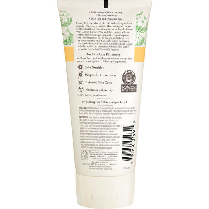 The back of the Burts Bees Sensitive Facial Cleanser bottle features descriptive text and graphics, highlighting its skin-nourishing, soap-free, and hypoallergenic properties. Ideal for dry skin care, instructions and ingredients are printed at the bottom.