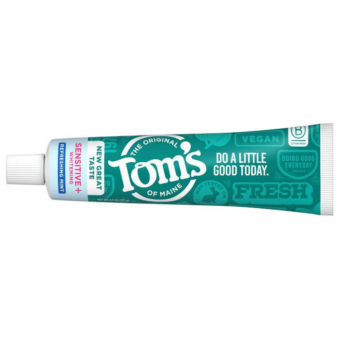 A tube of Tom's of Maine Sensitive + Whitening Fluoride Free Toothpaste on a teal background features phrases like Do a little good today, Fresh, and Vegan, with blue and green packaging highlighting rapid sensitivity relief and a white cap.