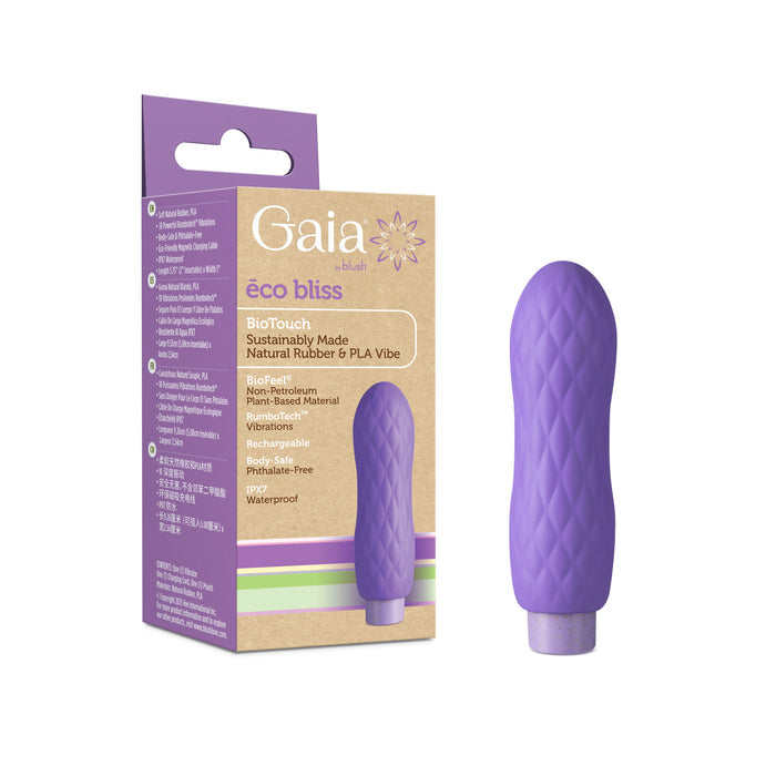 A small, purple, textured vibrator from Blush Gaia stands by its Eco Bliss box, showcasing a rechargeable waterproof design made from sustainable materials.