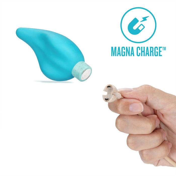 A hand holds a small magnetic charging connector, with a blue device positioned above it. The connector is ready to attach to the device, which has a matching magnetic base. The text "MAGNA CHARGE™" appears alongside a magnet icon.