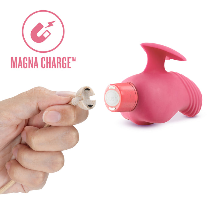 A hand holds a magnetic charging cable near a pink, ribbed device. The device has a circular charging port at the base. A logo with a magnet and lightning bolt symbol and the text "MAGNA CHARGE™" appear in the top left corner.