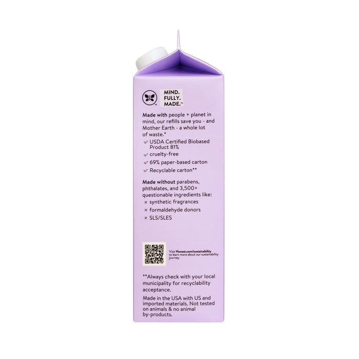 The Honest Companys Shampoo+ Body Wash carton refill features a side view showcasing eco-friendly benefits: cruelty-free, tear-free, recyclable, synthetic fragrance-free. It displays seals for USDA Certified Biobased Product and recyclable packaging to promote less waste.