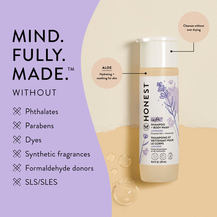 A bottle of The Honest Companys Shampoo + Body Wash on a beige surface surrounded by bubbles. This tear-free, 2-in-1 formula features Aloe and Chamomile Extract and excludes phthalates, parabens, dyes, synthetic fragrances, formaldehyde donors, and SLS/SLES.