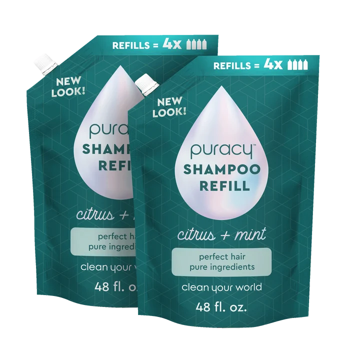 Two pouches of Puracy Shampoo (Sulfate/Paraben/Silicone-Free) refill, infused with botanical extracts and essential oils in a citrus + mint scent, 48 fl. oz. each, featuring a new look and updated refill information.
