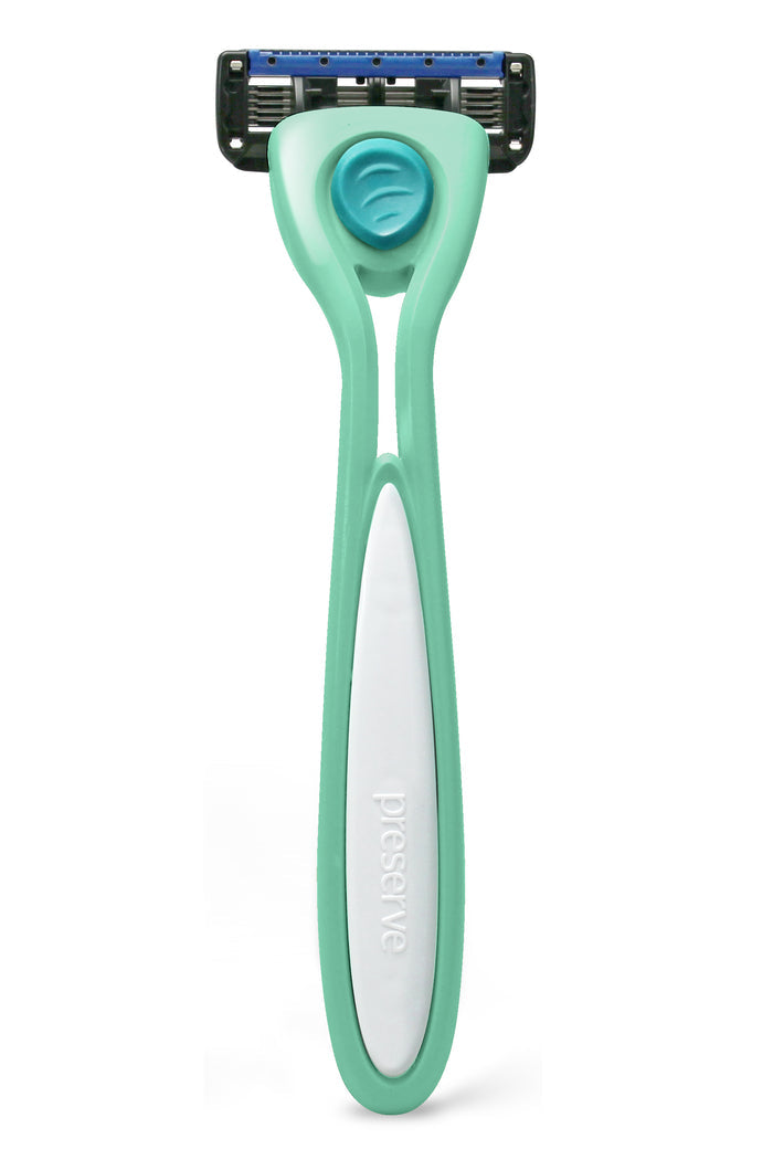 The Shave 5 Starter Set by Preserve features a mint green razor with a multi-blade head made from recycled plastic, a white grip, and handle adorned with a blue circular logo.