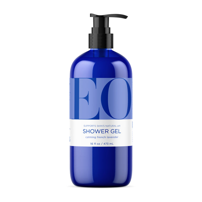 An EO Products blue Shower Gel bottle with a black pump features labels saying Supports Skins Natural pH and Calming French Lavender. This 16 fl oz (473 mL) moisturizing blend offers a tranquil shower experience.