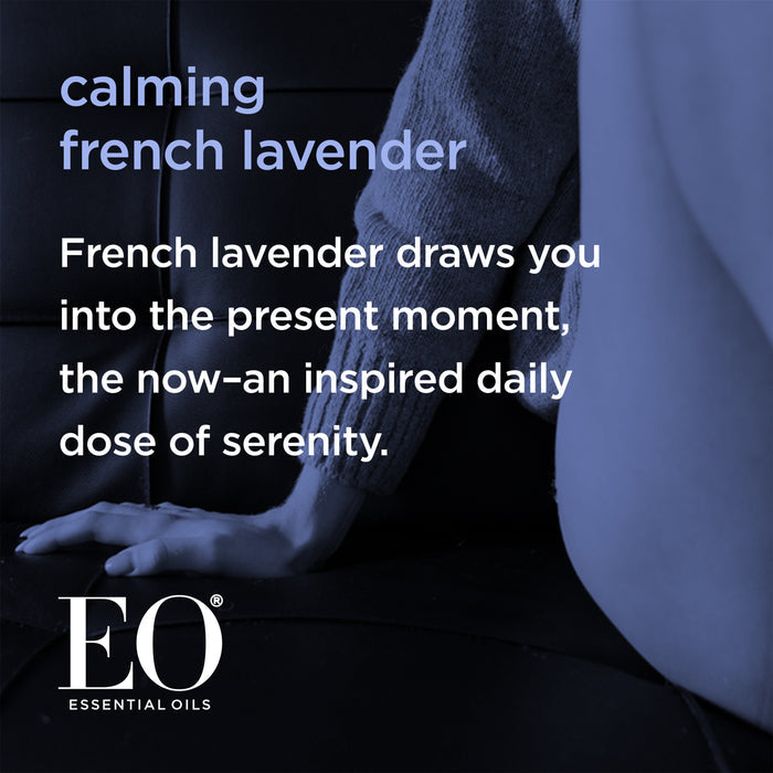 A person is seated on a dark sofa, with their hand resting beside them. Text on the image reads: "calming french lavender. French lavender draws you into the present moment, the now-an inspired daily dose of serenity." EO Essential Oils logo is at the bottom.