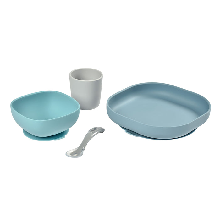 The BEABA Silicone Baby Feeding Set, perfect for toddler feeding, includes a BPA-free light blue bowl and plate, plus a grey cup and spoon.