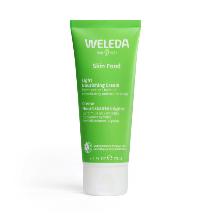 The Weleda Skin Food Light Nourishing Cream comes in a 2.5 fl oz (75 ml) green tube with a white cap, featuring bilingual English and French labels, and contains a plant-extract formula to deeply nourish the skin.
