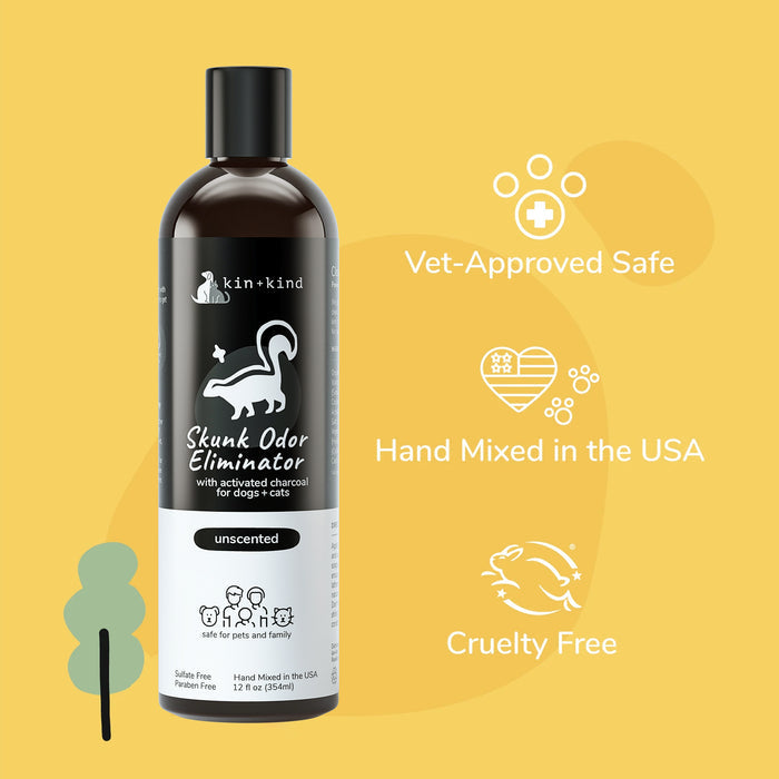 Image of a black bottle labeled kin+kind Skunk Odor Eliminator Shampoo for Dogs & Cats with activated charcoal. Vet-approved safe, hand mixed in the USA, and cruelty-free, this natural skunk shampoo is on a light yellow background.