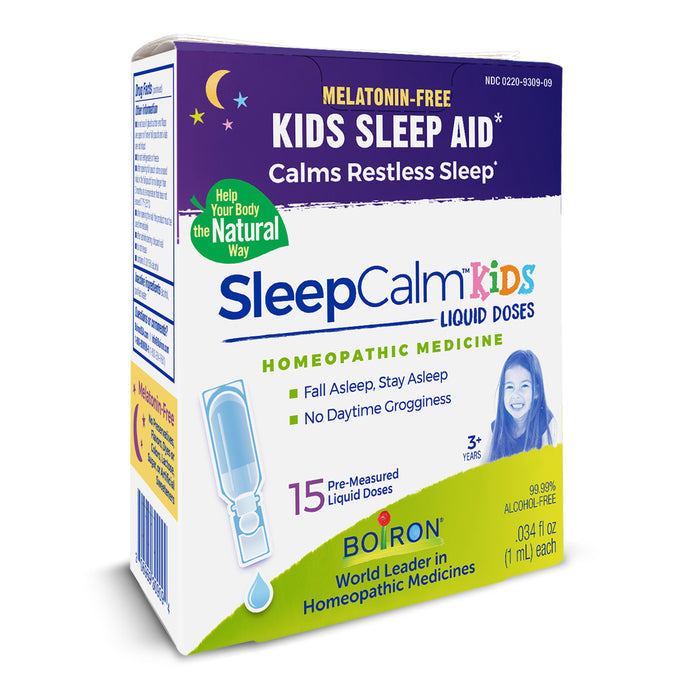 Image of Boirons SleepCalm Kids box, a melatonin-free sleep aid with plant-based ingredients. Offers homeopathic relief in 15 pre-measured liquid doses for children aged 3 and up. Packaging is mainly white and blue with green accents.