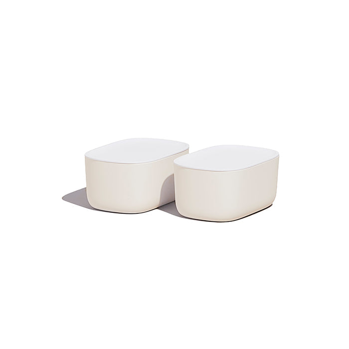 Two modern, white, rounded rectangular Small Storage Bins by Open Spaces sit side by side on a white background, casting a soft shadow to the left—ideal for those seeking stylish solutions for organizing small items.