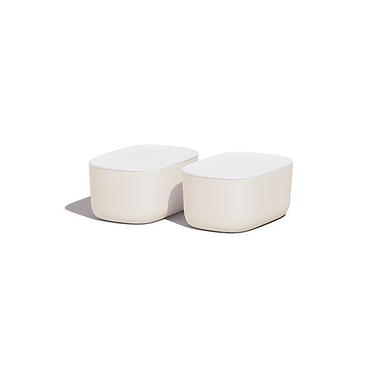 Two modern, white, rounded rectangular Small Storage Bins by Open Spaces sit side by side on a white background, casting a soft shadow to the left—ideal for those seeking stylish solutions for organizing small items.
