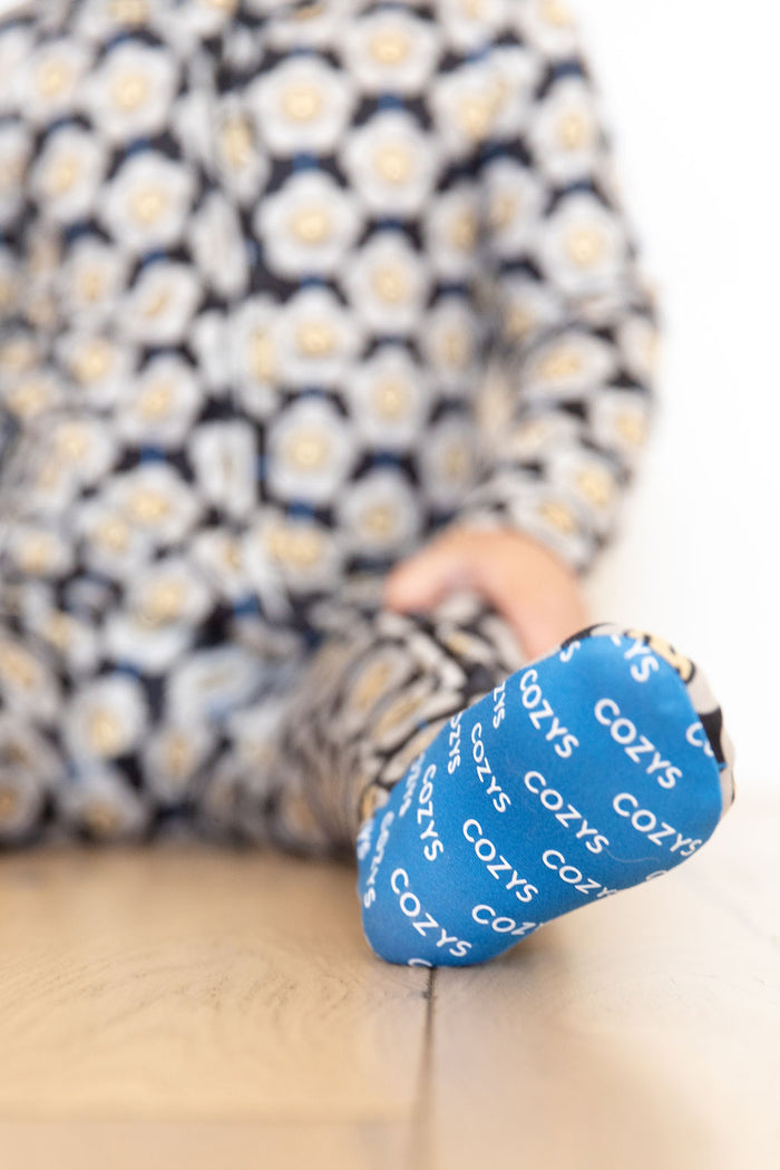 SMILEY GROOVY DAISY | FOOTIE ONE PIECE