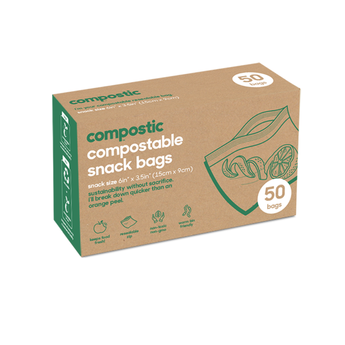 The Compostic Snack Bags box is brown with green text and images, including a hand holding an orange and a bag illustration. Highlighting sustainability, it contains 50 renewable plant-based, home-compostable bags.