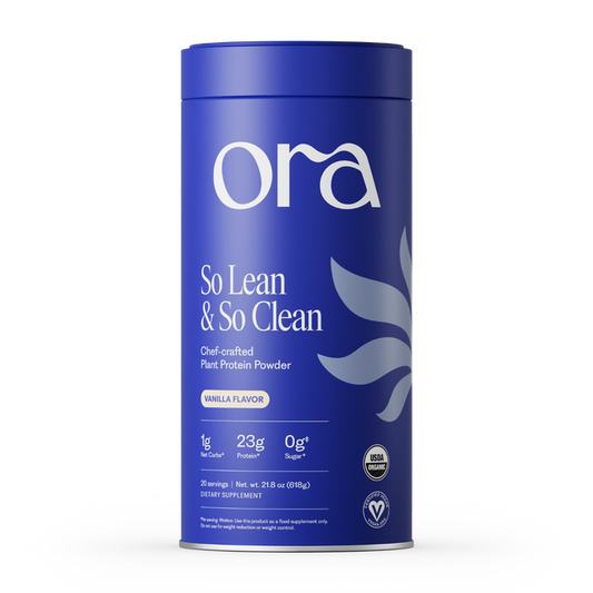 A blue canister of Ora Organic’s So Lean & So Clean: Organic Vegan Protein Powder in vanilla, featuring 23g protein, 0g sugar, USDA organic and vegan certifications, and digestive enzymes for absorption.