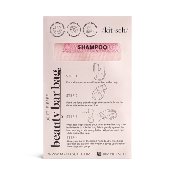 The Kitsch Soap Bar Bag showcases a pink shampoo bar in a handy hanging bag, perfect for streamlining your shower routine. It includes usage instructions and the brands social media handles, ensuring optimal airflow while keeping your essentials organized.