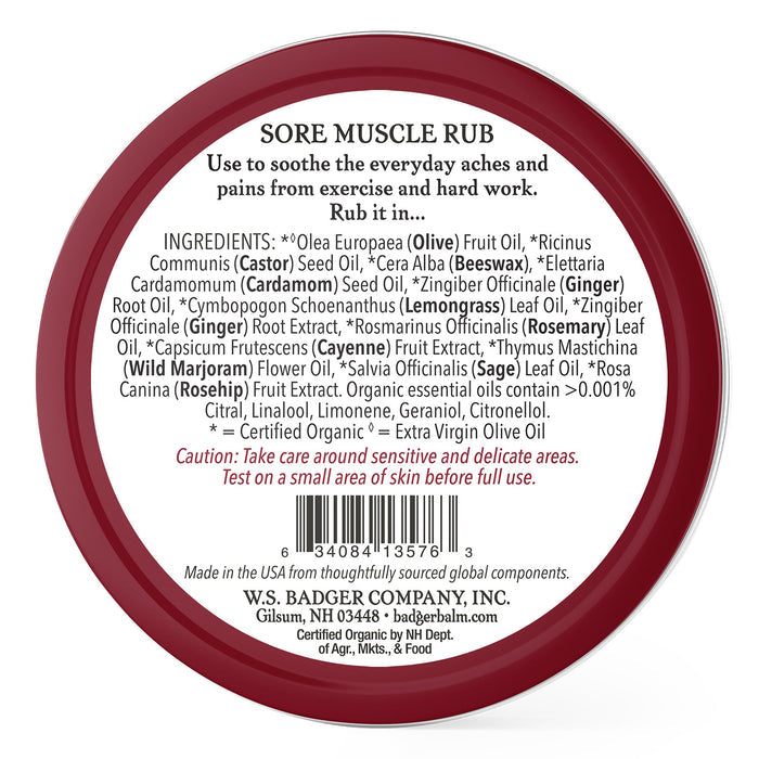 A round container of Sore Muscle Rub by Badger Balm lists organic ingredients like olive, cayenne, and cardamom oils. This warming balm is made in the USA, with a recommendation to test on a small skin area before use.