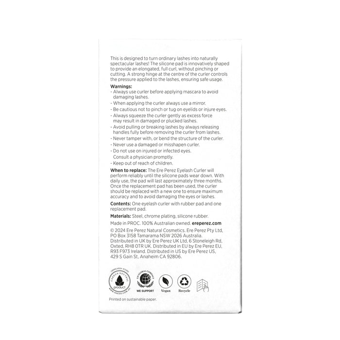 The image shows the Ere Perez Spectacular Eyelash Curler packaging with instructions, safety warnings, usage tips, material details, recycling info, and a hypoallergenic silicone pad for a natural curl. Made in PROC with contact information for UK, EU, and USA.