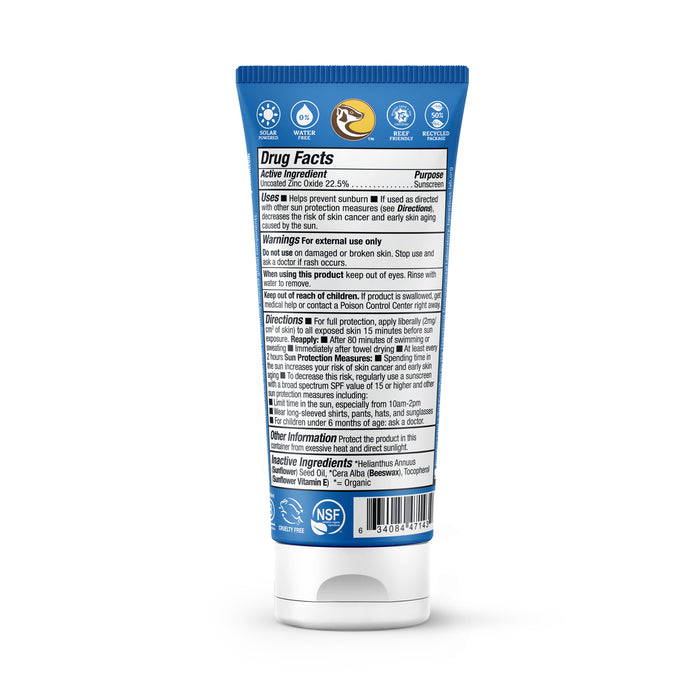 A tube of toothpaste with a blue label and white text sits base-down, featuring drug facts, warnings, directions, and inactive ingredients. Certification logos near the cap make it look like Badger Balms Sport Mineral Sunscreen Cream - SPF 40.