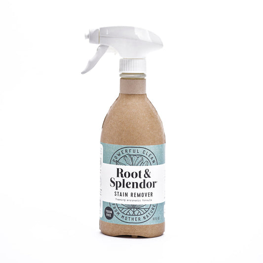 Root & Splendors Stain Remover comes in a spray bottle with paper covering and white label reading Powerful Clean and Foaming Enzyme Action. It features a white spray nozzle and eco-friendly packaging made with natural ingredients.