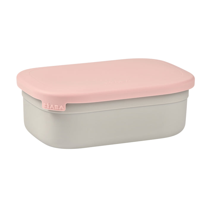 The BEABA Stainless Steel Bento Lunch Box features a minimalist design with a slightly raised, light pink lid and a light gray base. The brand name is embossed on the side, and the eco-friendly container is perfect for everyday use.