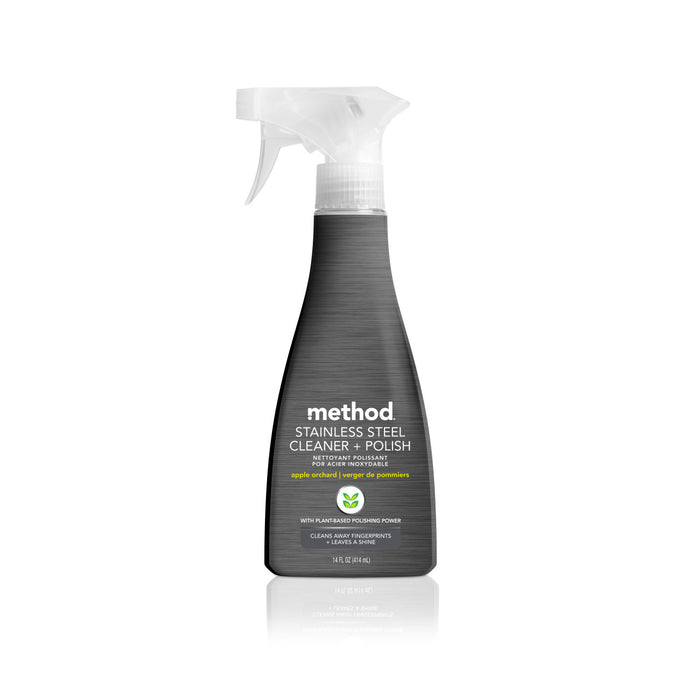 The Method Stainless Steel Cleaner + Polish comes in a sleek grey spray bottle with a clear trigger, showcasing an apple orchard scent, plant-based polishing power, and non-toxic formula. Safe for surfaces, it offers a 14 fl oz (414 ml) capacity.