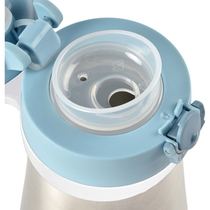 Close-up of a Stainless Steel Toddler Thermos Water Bottle by BEABA, for ages 18+ months, showcasing the light blue push-button lid with a partly open cap to highlight its leakproof latch mechanism and circular opening.